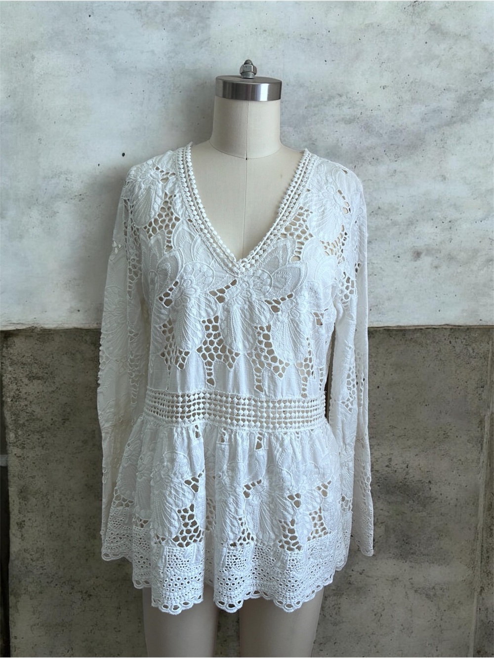 Luna Moon Crochet lace featuring a delicate floral pattern and V neck Blouse.